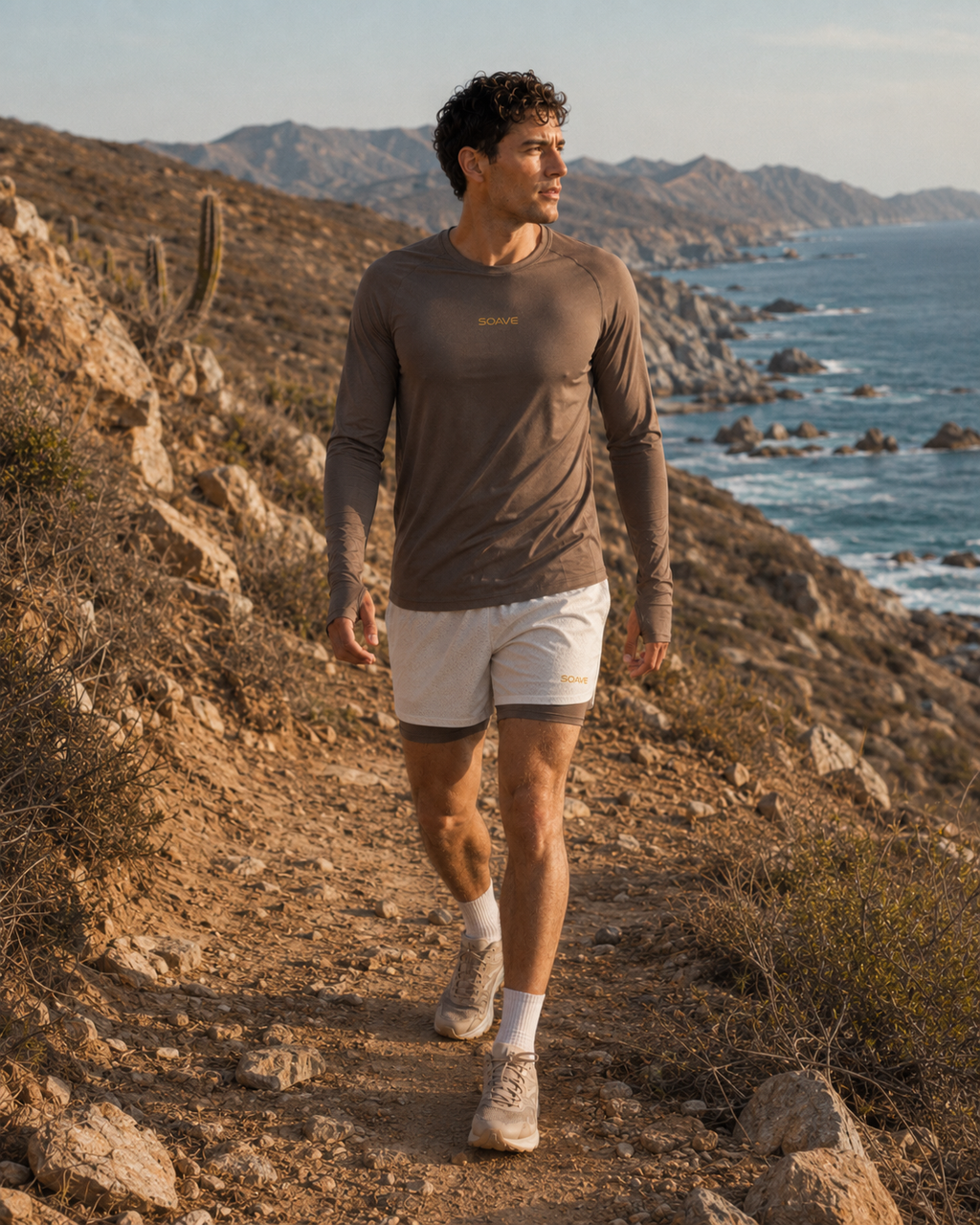 Runner wearing SOAVE Coastline LS and Baja 1 Trail Short on a coastal trail in Baja California Sur