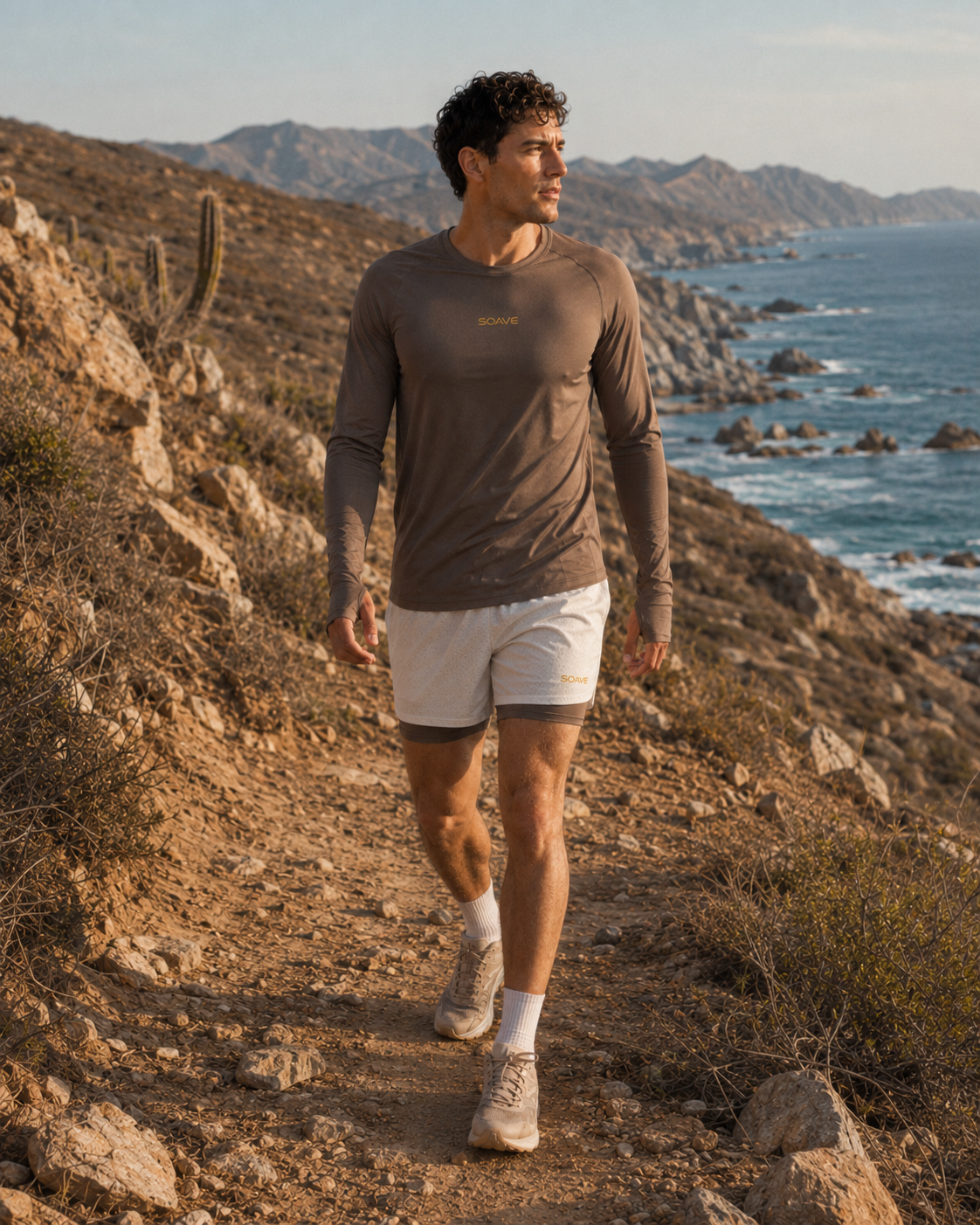 Runner wearing SOAVE Coastline LS and Baja 1 Trail Short on a coastal trail in Baja California Sur